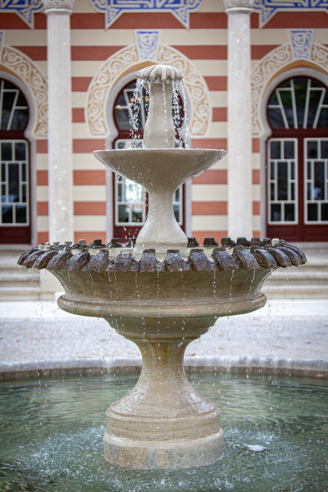 Water over Stone — The fountain at play before the galilé doors.