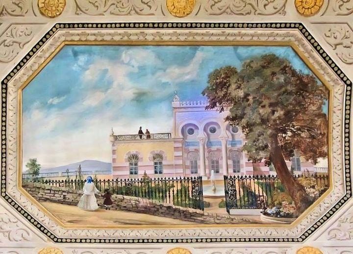 The Yellow Palace — An early painting of the estate: the palace in ochre, the great cork oak already old.